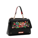 Face : Sac à main Nicole Lee Keep Dreaming à fleurs et strass, vue de face
Porté : Femme portant le sac Nicole Lee Keep Dreaming à la main
Détail : Fleurs en relief, sequins et clous du sac Nicole Lee Keep Dreaming
Intérieur : Doublure imprimée et poches du sac Nicole Lee Keep Dreaming
